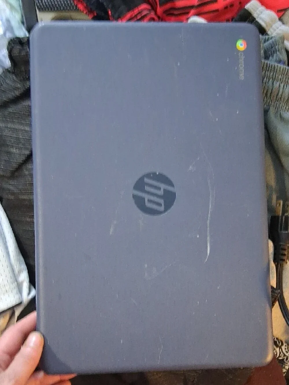 HP Laptop with Black and Purple Screen Damage